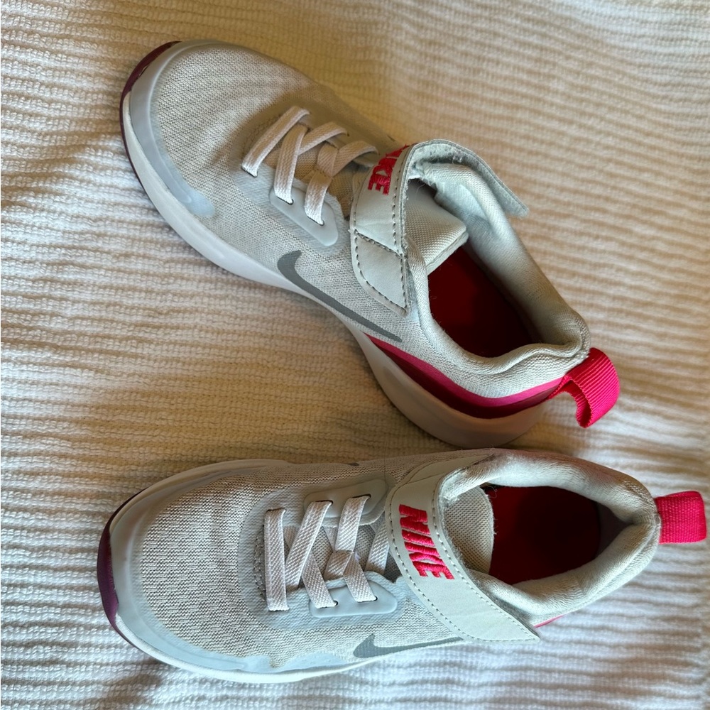 Nike girls pink and gray tennis shoes, size 10.5.